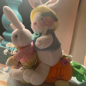 Bunnies on carrot Easter new